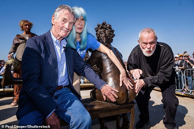 Michael Palin (left), Jones's Monty Python co-star, said he hoped his friend's 'wonderfully generous bottom' can be 'an emblem of the town he loved so much'. Pictured: Palin, with Python co-star Gilliam, right, and frequent collaborator Carol Cleveland, centre