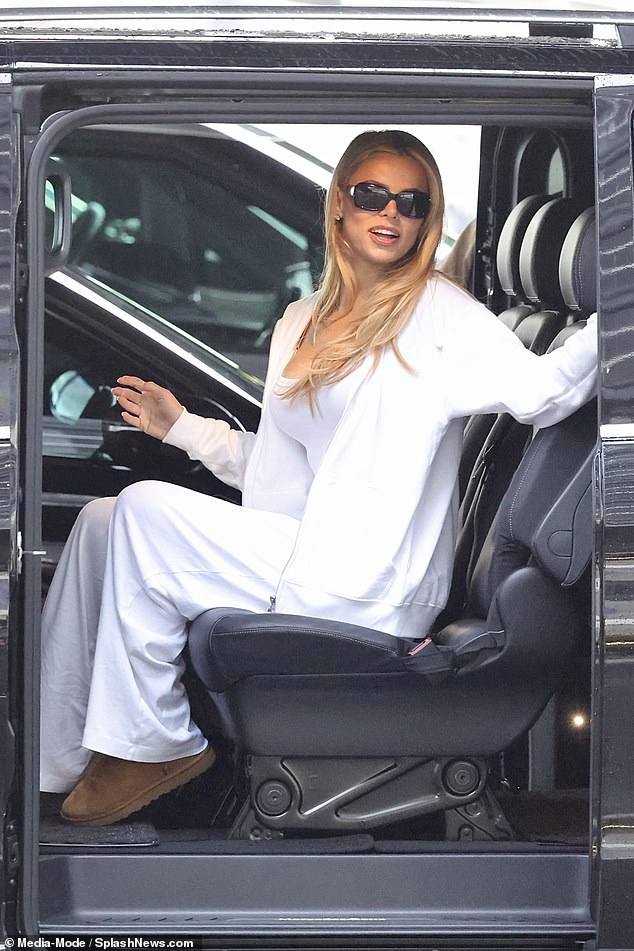 She topped off her casual look with a hoodie, added Ugg boots and shielded her eyes with sunglasses