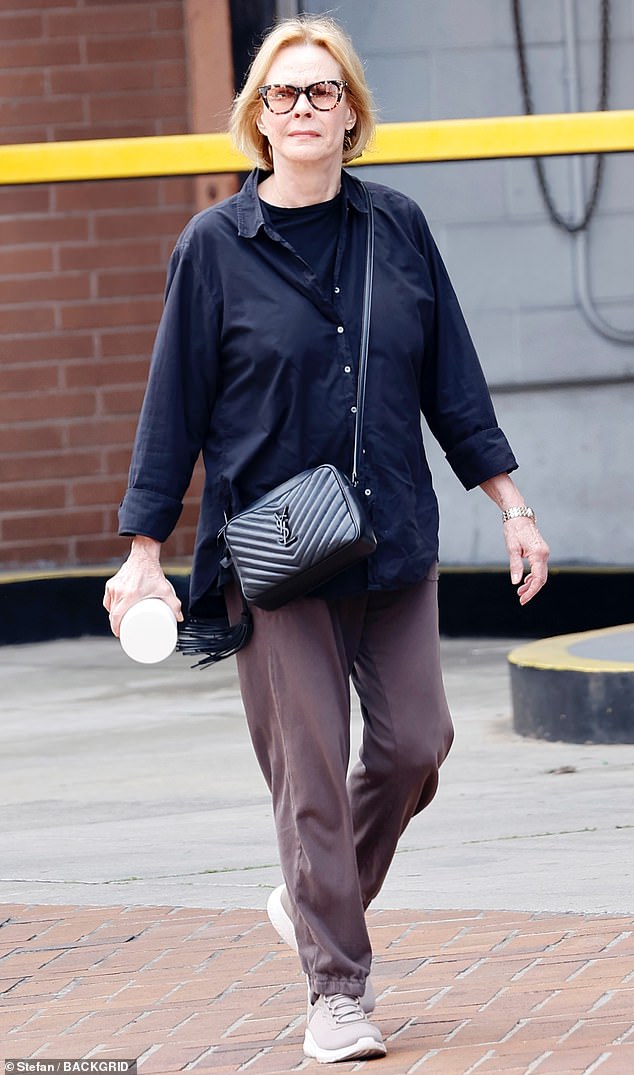 The actress kept it casual wearing a black button up as well as a plain black shirt underneath
