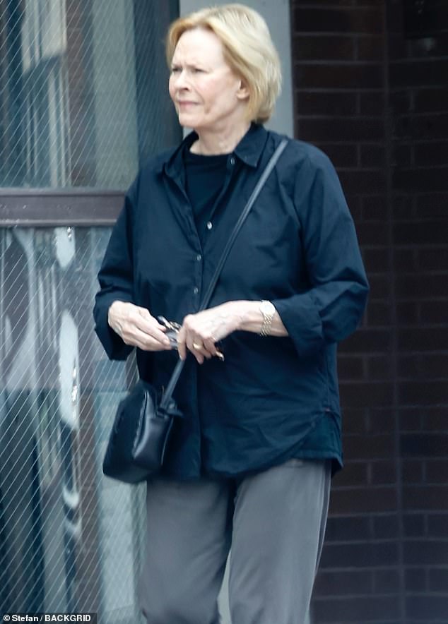 Williams completed the ensemble by sporting a pair of black-rimmed shades and carried a black Yves Saint Laurent purse over her shoulder