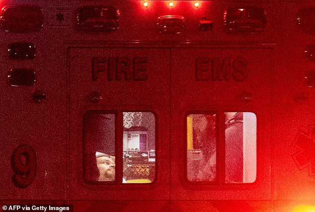 Shooting suspect Cole Thomas Allen, 31, lies in an ambulance after being escorted from the dinner. US Attorney for DC Jeanine Pirro said he will be arraigned Monday on at least three charges