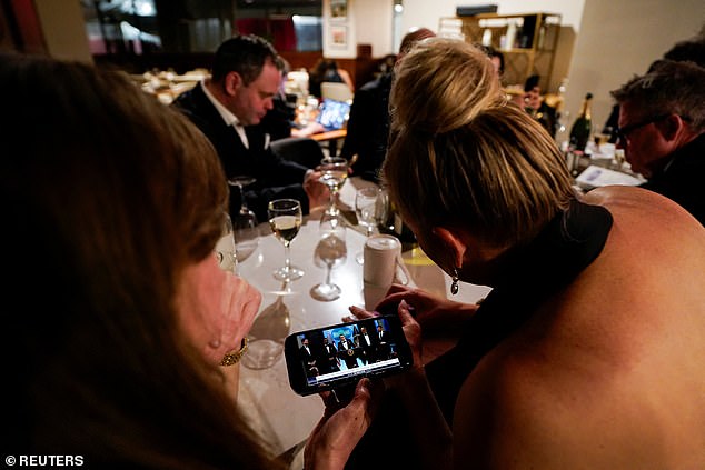 Journalists still trapped at the Hilton tuned into his briefing using any devices they could find