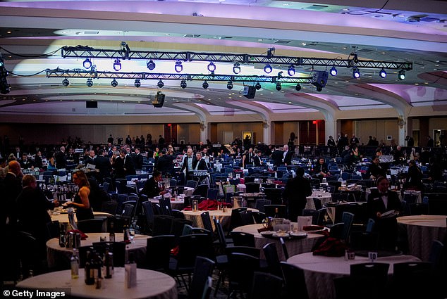 The banquet hall contained thousands of journalists who frantically took cover under tables and chairs before they were also evacuated