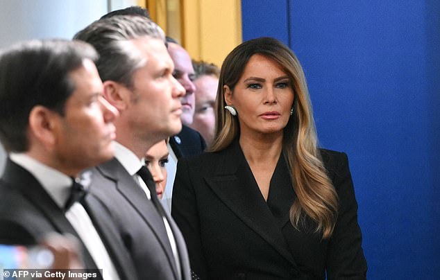 The First Lady was among the prominent figures watching from the sidelines as Donald Trump addressed reporters. The president said the incident had been 'traumatic' for his wife Melania