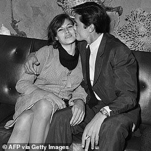 Alain Delon kisses his wife Nathalie