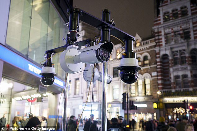 Met police facial recognition cameras watch over Christmas shoppers outside Tottenham Court Road station, on 1 December 2025, in London