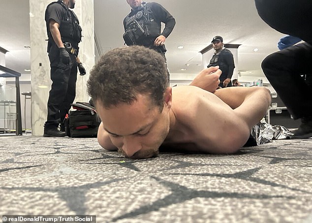 Cole Tomas Allen, 31, is thought to have been targeting members of the Trump administration when he charged into the ballroom at the White House Correspondents’ Dinner on Saturday night. He is pictured after he was tackled to the ground and arrested