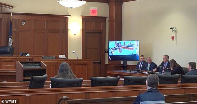 Hall sits in court during Friday's sentence