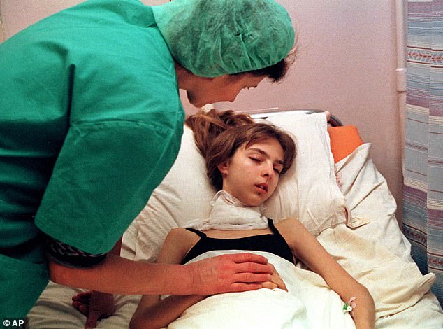 The biggest danger after the disaster is from food contaminated with radioactive iodine, which caused 5,000 thyroid cancer cases after Chernobyl, leading to 15 fatalities. Pictured: A 17-year-old girl recovering from surgery to remove her cancerous thyroid in Kyiv, Ukraine