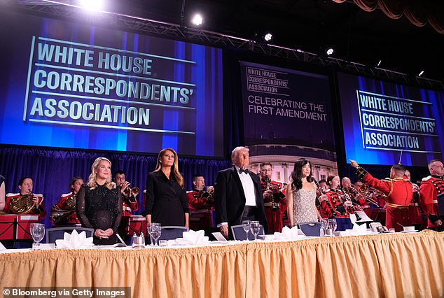 Karoline Leavitt, White House press secretary, from left, US First Lady Melania Trump, President Donald Trump, and Weijia Jiang, White House Correspondents' Association president and CBS Senior White House Correspondent, during the White House Correspondents' Association (WHCA) dinner in Washington, DC, US on Saturday, April 25, 2026