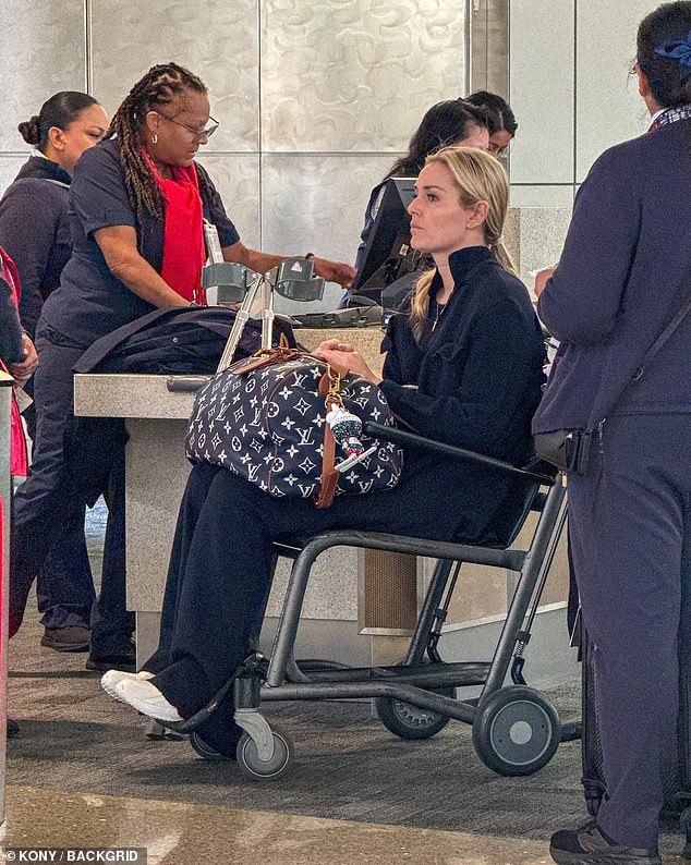 The Olympic champion was in a wheelchair as she continues her recovery from a brutal crash