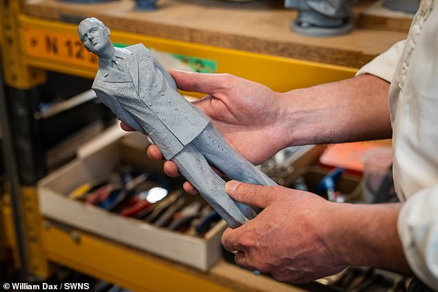 Prince Philips statue will be smaller and closer to the ground that Elizabeth's which he will be looking up at from 100 yards away through the Marlborough Gate in St James's Park