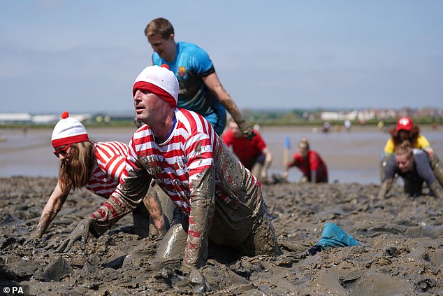 Runners dressed as Where's Wally crawled across the plains of the River Blackwater