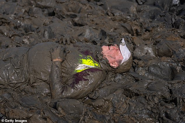 One racer thought it was all too much and seems to have chosen to lie down and have a rest in the thick mud