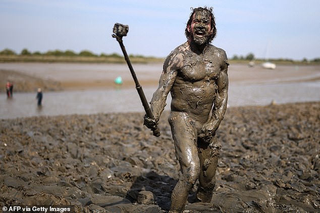 One racegoer decided to bring their selfie stick with them on his muddy journey
