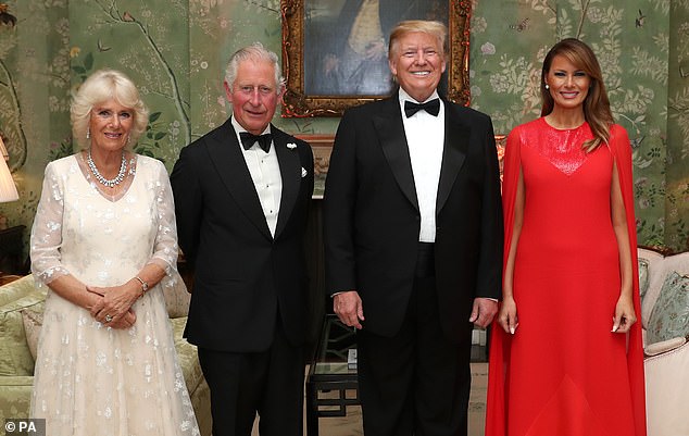 A flashback to June 2019, inside Winfield House in London. Melania Trump pictured in a  floor length scarlet Givenchy gown to host a reciprocal dinner for the British Royal Family during their first term in office