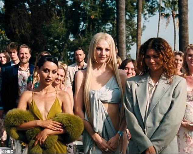 Among the guests were Cassie's scantily-clad high school friends - nemesis-turned-social media manager Maddy (Alexa Demie) and sober drug dealer Rue (Zendaya), who brought transgender painter-escort Jules (Hunter Schafer) as her plus one