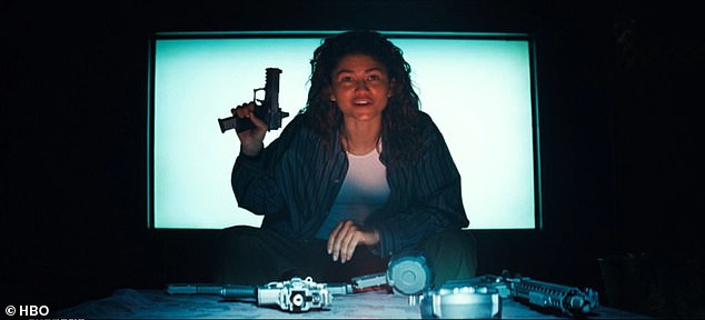 The aimless character has transformed herself from a drug mule to an arms dealer, selling rifles and handguns on three percent commission like she's doing a TikTok get-ready-with-me video