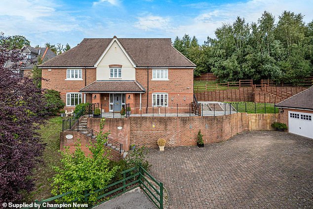 Ms Montgomerie claims Mr Minns had agreed to sign over the 'substantial' detached house in Fleet, Hampshire, in exchange for her writing off £750,000 in loans she claims he owes her
