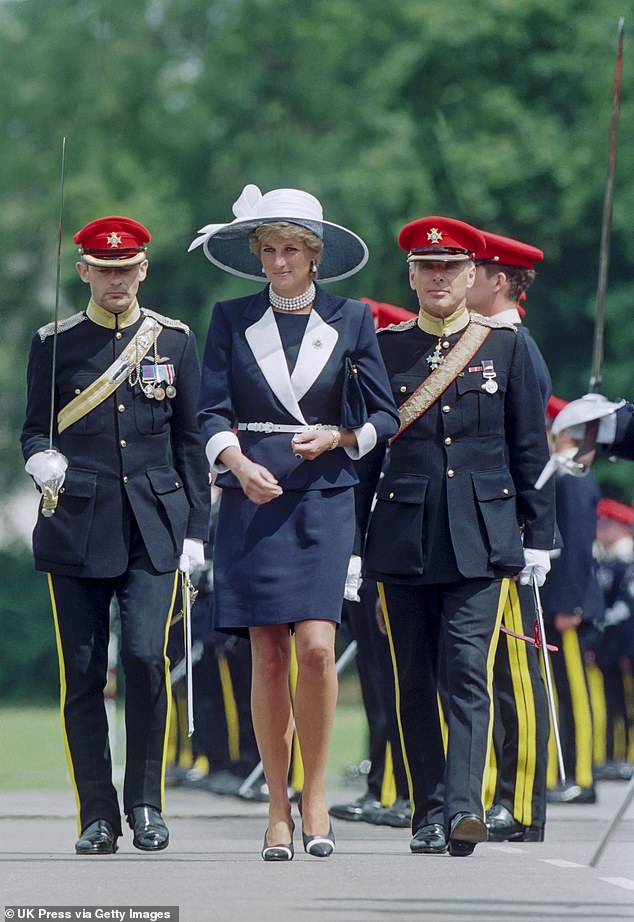 Kate's overall look was also rather reminiscent of Diana's style when she stepped out in 1995 to present new colours to the Light Dragoon Guards Regiment Ipictured)
