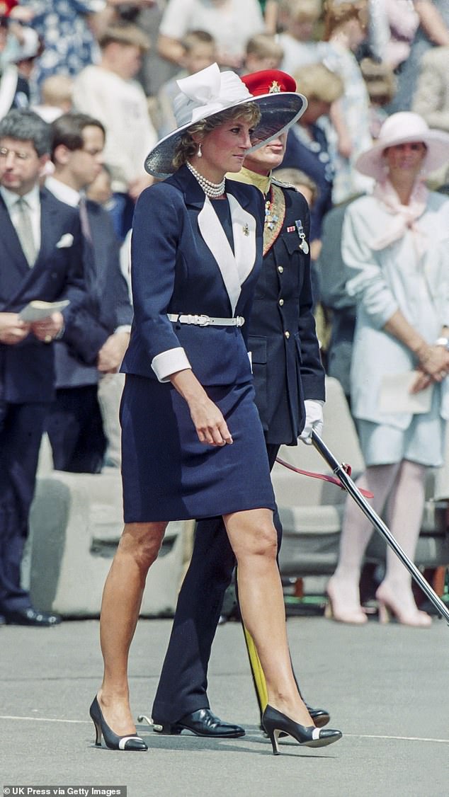Diana's navy skirt suit with white details bore an uncanny resemblance to Kate's outfit of choice on Saturday, while the late princess also opted for a pair of Collingwood pearl earrings that have since been passed onto Kate