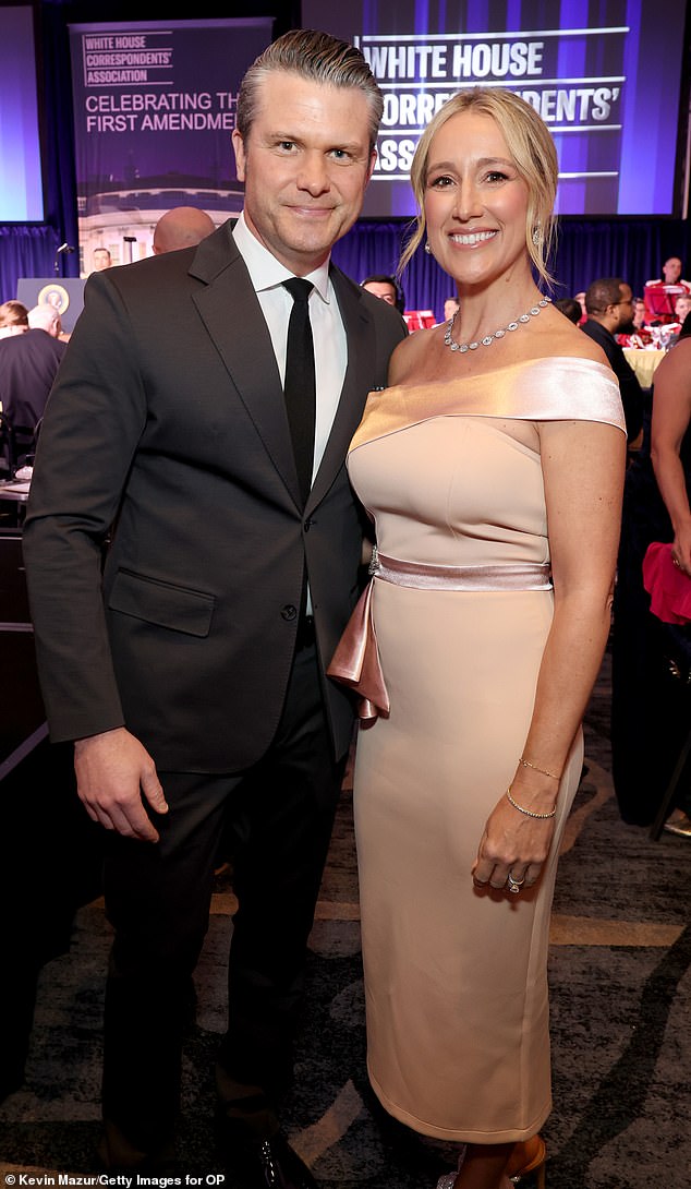 Jennifer stunned in a curve-hugging, blush pink dress that featured a pink silk off-the-shoulder detailing
