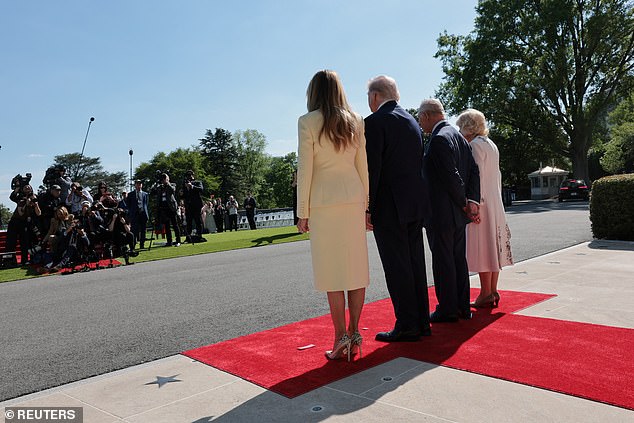 Reporters stood on the White House's South Lawn to photograph the powerful couples