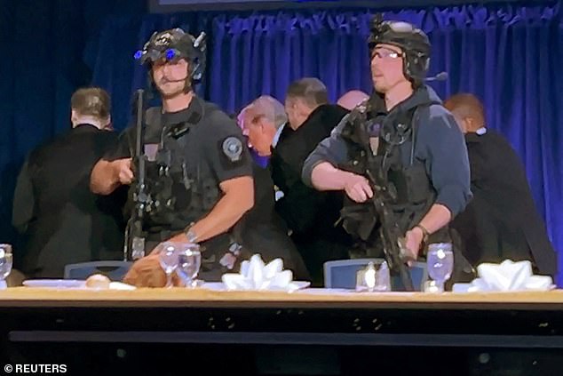 Trump was escorted out of the ballroom by security personnel after shots rang out
