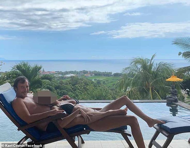 Before he was arrested in Budapest in 2024 to face trial in the US on money laundering charges, Cronin lived in Bali, Indonesia (pictured with a bikini-clad young woman)
