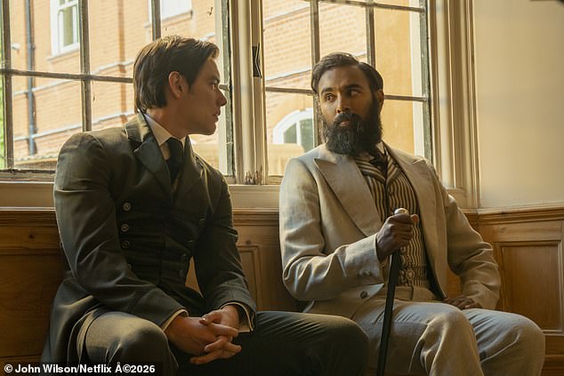 Viscount Tewkesbury (played by Louis Partridge) looks dapper in a suit while chatting to Dr. Watson (played by Himesh Patel)