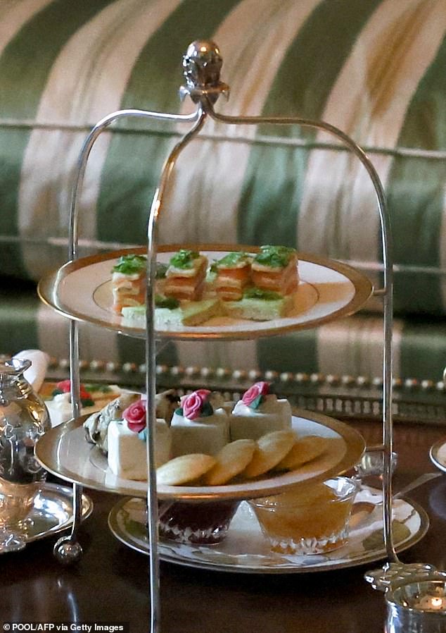 The King and Queen were also served an assortment of cakes, madeleines, and finger sandwiches on three-tiered cake stands