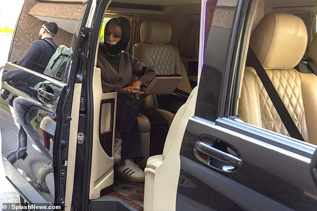 She stepped into a lavish waiting car while showing off her painful image