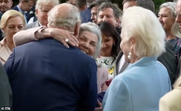 A sweet video captured the moment Barbara Allbritton, who once served as the Chair of The Prince of Wales Foundation in the US, warmly embraced the monarch, 77, before placing a light kiss on his cheek during a lavish tea party in Washington