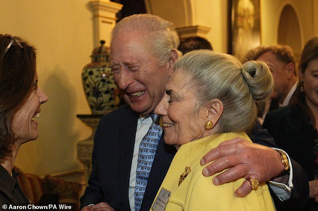In March, the King was similarly captured placing his arm around Barbara during a reception held at Clarence House to celebrate the inaugural Queen's Reading Room Medal recipients, honouring Selina Brown as the first winner of the prestigious award