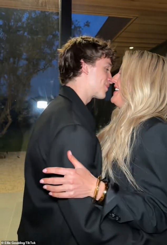 The camera then panned to show her walking right up to a waiting Beau and pulling him into a passionate kiss, before breaking into giggles