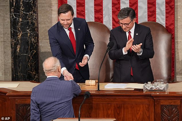 King Charles shaking hands with Vice President JD Vance and House Speaker Mike Johnson ahead of his speech