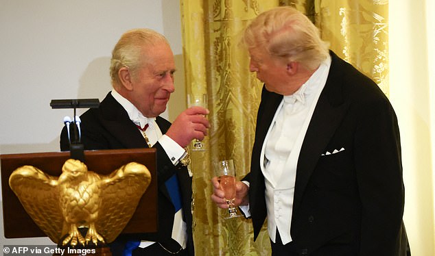 US President Donald Trump and Britain's King Charles III raise a toast during a State Dinner in the East Room of the White House