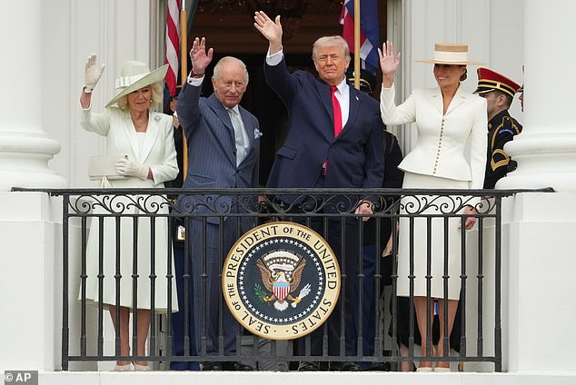 The Queen, King Charles III, President Donald Trump and First Lady Melania Trump wave to guests from the Blue Room Balcony of the White House today as the state visit continues