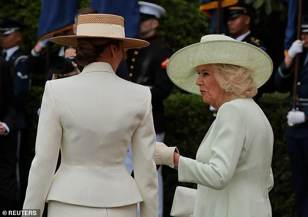 First Lady Melania Trump talks with Queen Camilla on the South Lawn of the White House