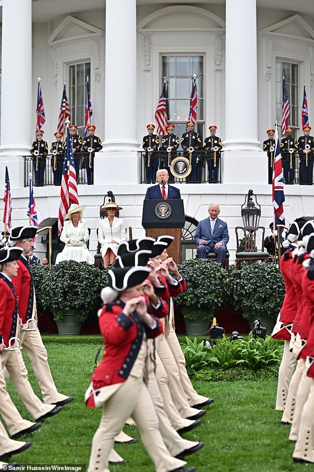 The Queen, the First Lady, the President and the King took in a ceremonial parade during the red-carpet-treatment visit
