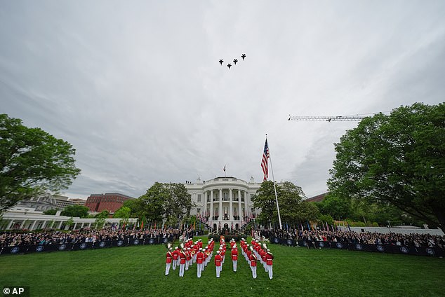 The King and Queen enjoyed a flyover from the Blue Room Balcony of the White House after inspecting US troops