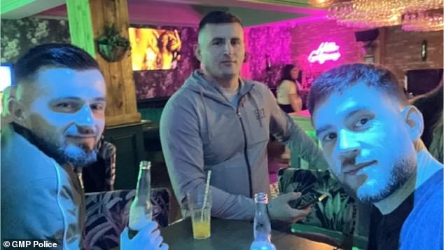 Left to right: Romeo Tosca, 26, Xhoi Kasaj, 30, and Indrid Hysembelli, 26, drinking in a bar