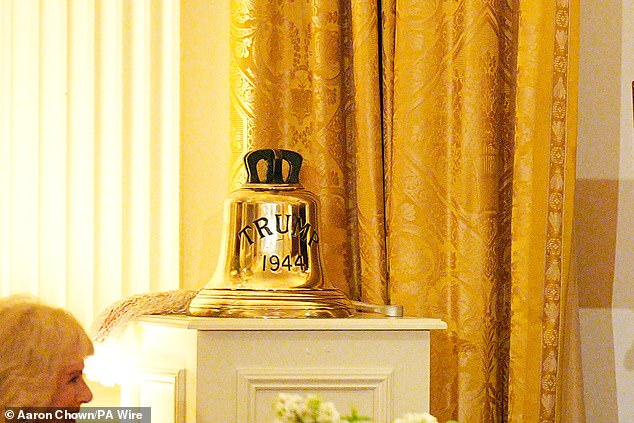 The bell from HMS Trump is displayed during the White House state dinner in Washington