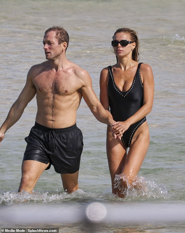 Insiders questioned whether his amorous moment was in fact a ploy to increase his chances of being picked for the role by being snapped with the model, after it was claimed he's on the shortlist to replace Daniel Craig