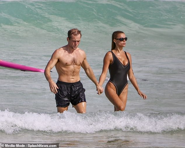 While some even suggested his new relationship was a 'showmance', Taron and Brooks have now doubled down against the talk with another romantic display