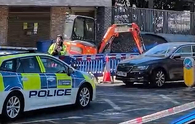 A video still showing a police car next to where one of the men was stabbed