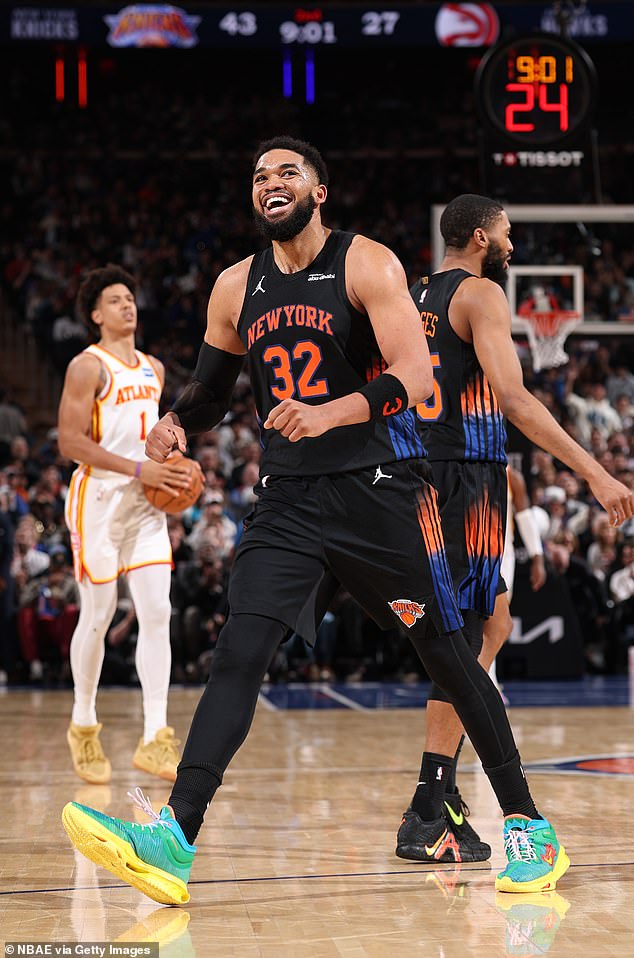 Towns celebrates during the game after helping his team claim victory over the Hawks