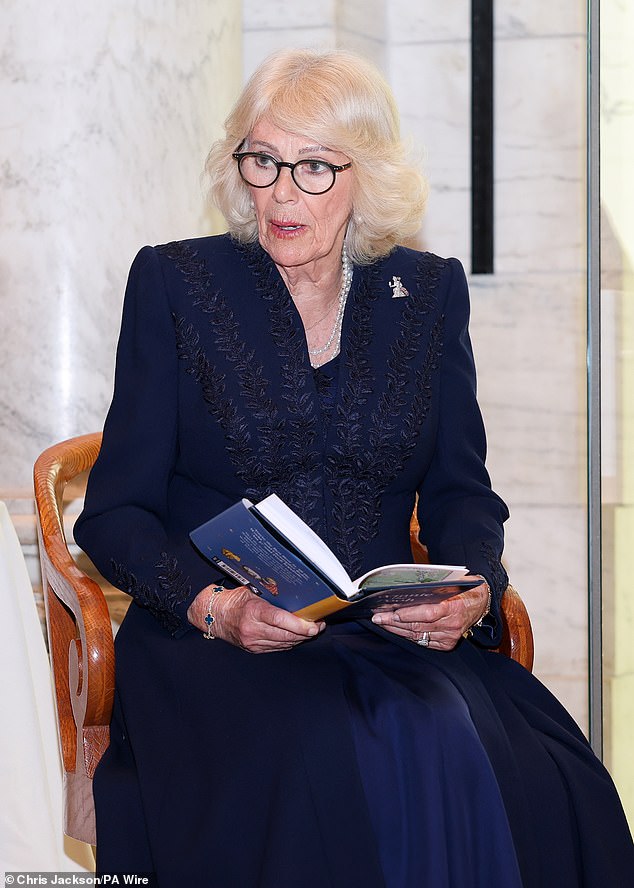 Queen Camilla reads Winnie-the-Pooh to children during a visit to the New York Public Library to celebrate literature