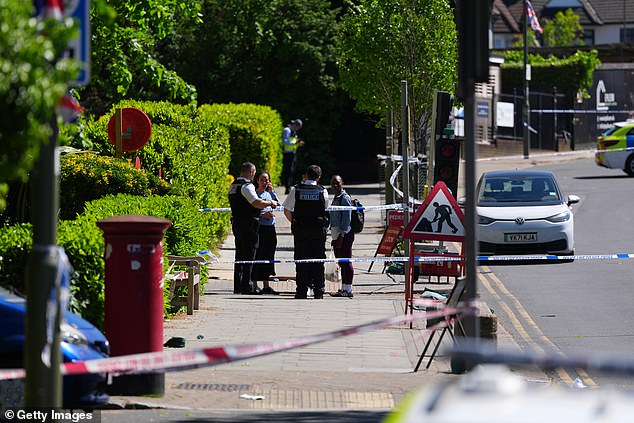 Other officers were seen speaking to members of the public