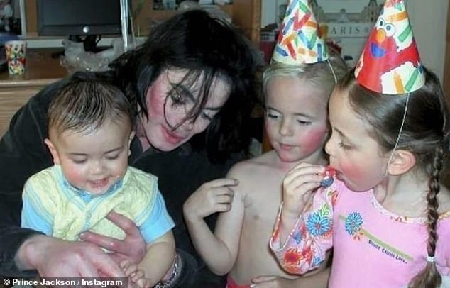 The 29-year-old, who is the producer of Michael, the new biopic about the Billie Jean hitmaker, also shared intimate details of his childhood with the eccentric superstar. Pictured with late dad Michael and two siblings, Paris (right) and Bigi 'Blanket' Jackson (left)